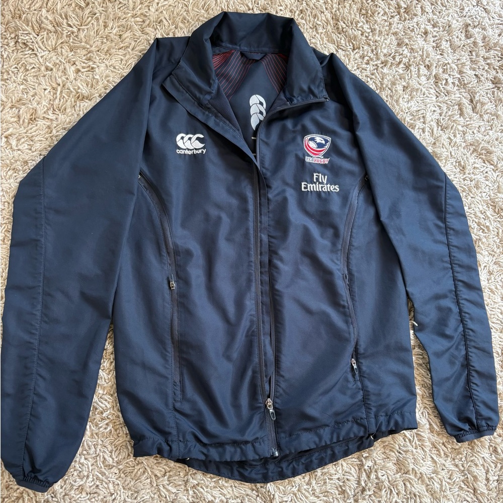 Canterbury Men's Navy Performance Jacket with Fly Emirates Logo